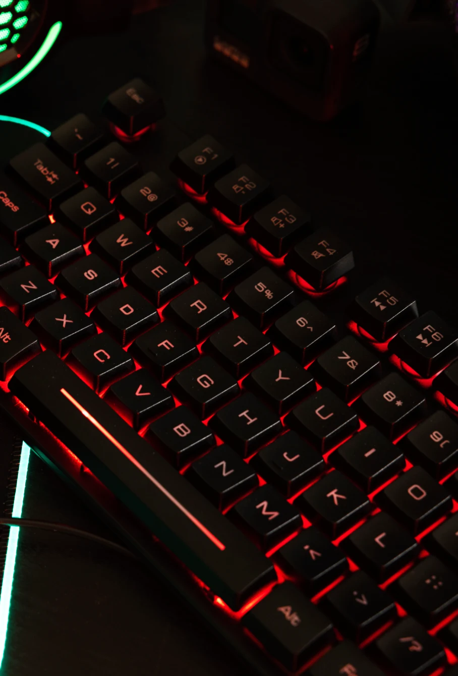 view-neon-illuminated-gaming-desk-setup-with-keyboard